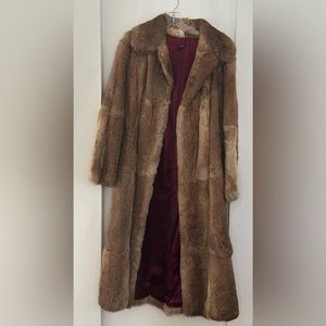 Beautiful full length fur coat. Fits size 6-10  but unsized. Fully line